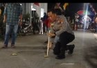 Polsek Liang Anggang Hidupkan Tradisi Balogo, Warga Antusias Meriahkan HUT Bhayangkara ke-80